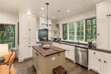 Welcome to this charming custom cottage, nestled among lush on Natures Walk At Chinquapin in North Carolina - for sale on GolfHomes.com, golf home, golf lot
