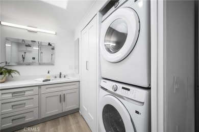 Step into this fully reimagined home in Mutual 5, where modern on Leisure World Seal Beach Golf Course in California - for sale on GolfHomes.com, golf home, golf lot