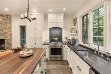Welcome to this charming custom cottage, nestled among lush on Natures Walk At Chinquapin in North Carolina - for sale on GolfHomes.com, golf home, golf lot