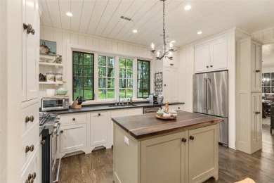 Welcome to this charming custom cottage, nestled among lush on Natures Walk At Chinquapin in North Carolina - for sale on GolfHomes.com, golf home, golf lot