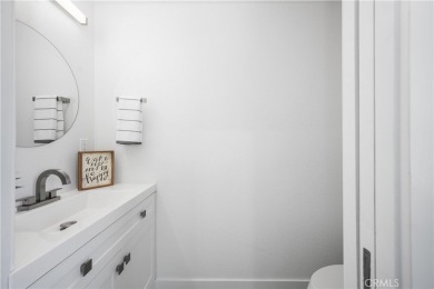 Step into this fully reimagined home in Mutual 5, where modern on Leisure World Seal Beach Golf Course in California - for sale on GolfHomes.com, golf home, golf lot