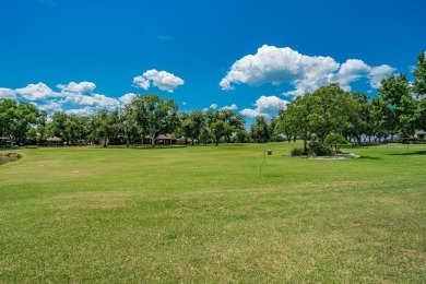 BEAUTIFUL STONE AND BRICK HOME on the par 3, 14th hole of the on Pecan Plantation Country Club in Texas - for sale on GolfHomes.com, golf home, golf lot