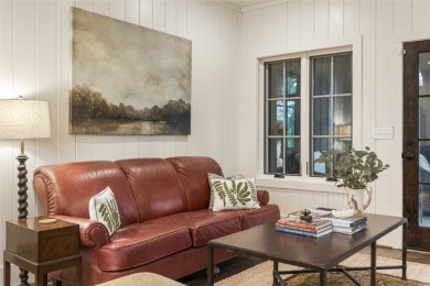 Welcome to this charming custom cottage, nestled among lush on Natures Walk At Chinquapin in North Carolina - for sale on GolfHomes.com, golf home, golf lot