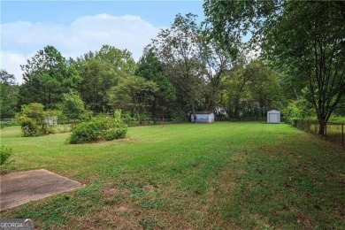 Beautifully renovated 4-bedroom, 2-bathroom home with on Browns Mill Golf Course in Georgia - for sale on GolfHomes.com, golf home, golf lot