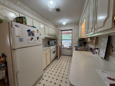 Welcome to this 4 bedroom, 2 bath home offering 1,816 sq ft of on Indian Hills Country Club in Arkansas - for sale on GolfHomes.com, golf home, golf lot