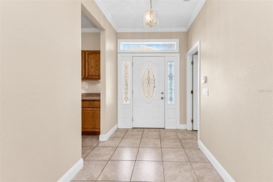 Under contract-accepting backup offers. Welcoming 3 bedroom, 2 on Deep Creek Golf Club in Florida - for sale on GolfHomes.com, golf home, golf lot