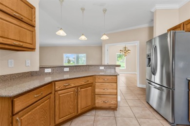 Under contract-accepting backup offers. Welcoming 3 bedroom, 2 on Deep Creek Golf Club in Florida - for sale on GolfHomes.com, golf home, golf lot