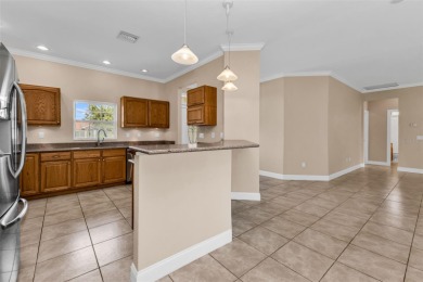 Under contract-accepting backup offers. Welcoming 3 bedroom, 2 on Deep Creek Golf Club in Florida - for sale on GolfHomes.com, golf home, golf lot