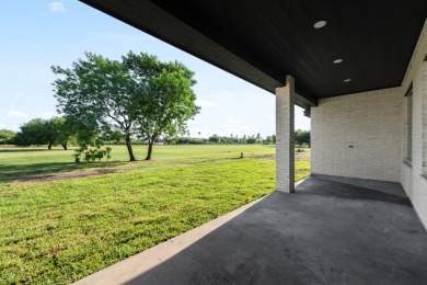 Welcome to your dream home! This spacious 4 bedroom 3 bath on Harlingen Country Club in Texas - for sale on GolfHomes.com, golf home, golf lot