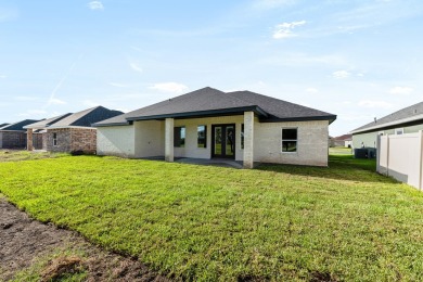 Welcome to your dream home! This spacious 4 bedroom 3 bath on Harlingen Country Club in Texas - for sale on GolfHomes.com, golf home, golf lot