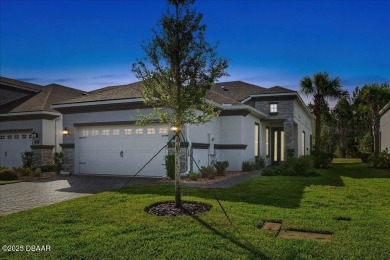 The Arbor II Townhome features a low-maintenance design with a on Plantation Bay Golf and Country Club in Florida - for sale on GolfHomes.com, golf home, golf lot
