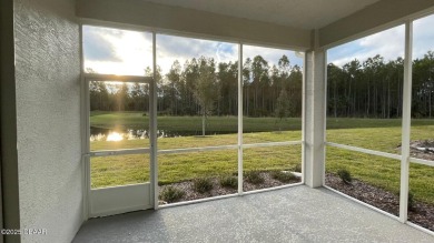 The Arbor II Townhome features a low-maintenance design with a on Plantation Bay Golf and Country Club in Florida - for sale on GolfHomes.com, golf home, golf lot