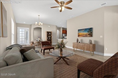 The Arbor II Townhome features a low-maintenance design with a on Plantation Bay Golf and Country Club in Florida - for sale on GolfHomes.com, golf home, golf lot
