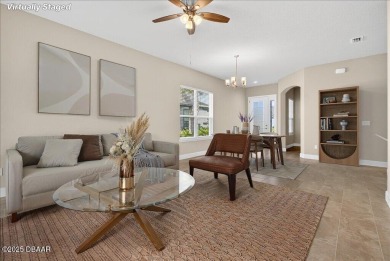 The Arbor II Townhome features a low-maintenance design with a on Plantation Bay Golf and Country Club in Florida - for sale on GolfHomes.com, golf home, golf lot