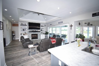 This beautifully landscaped property is situated directly on the on Wild Wing Plantation in South Carolina - for sale on GolfHomes.com, golf home, golf lot
