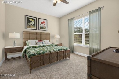 The Arbor II Townhome features a low-maintenance design with a on Plantation Bay Golf and Country Club in Florida - for sale on GolfHomes.com, golf home, golf lot