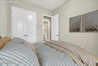 The Arbor II Townhome features a low-maintenance design with a on Plantation Bay Golf and Country Club in Florida - for sale on GolfHomes.com, golf home, golf lot