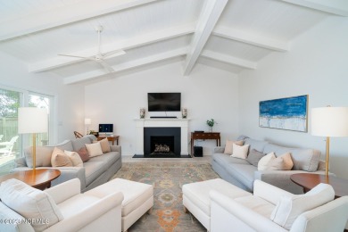 This stunning soundfront home in Pine Knoll Shores has been on The Country Club of the Crystal Coast in North Carolina - for sale on GolfHomes.com, golf home, golf lot