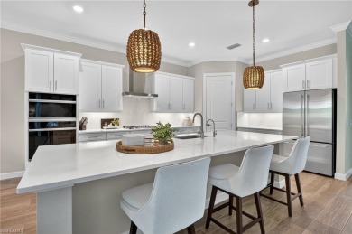 This nearly new luxury residence in the prestigious Marsh Cove on The Golf Club At Fiddlers Creek in Florida - for sale on GolfHomes.com, golf home, golf lot