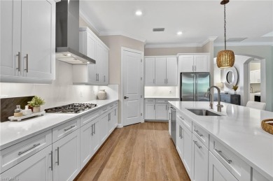 This nearly new luxury residence in the prestigious Marsh Cove on The Golf Club At Fiddlers Creek in Florida - for sale on GolfHomes.com, golf home, golf lot