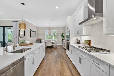 This nearly new luxury residence in the prestigious Marsh Cove on The Golf Club At Fiddlers Creek in Florida - for sale on GolfHomes.com, golf home, golf lot