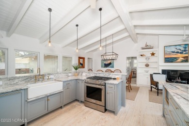 This stunning soundfront home in Pine Knoll Shores has been on The Country Club of the Crystal Coast in North Carolina - for sale on GolfHomes.com, golf home, golf lot