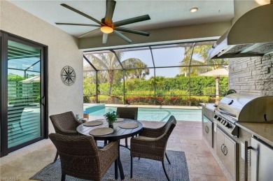 This nearly new luxury residence in the prestigious Marsh Cove on The Golf Club At Fiddlers Creek in Florida - for sale on GolfHomes.com, golf home, golf lot