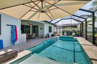 This nearly new luxury residence in the prestigious Marsh Cove on The Golf Club At Fiddlers Creek in Florida - for sale on GolfHomes.com, golf home, golf lot