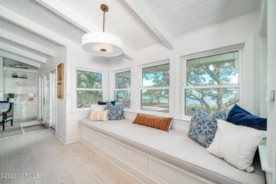 This stunning soundfront home in Pine Knoll Shores has been on The Country Club of the Crystal Coast in North Carolina - for sale on GolfHomes.com, golf home, golf lot