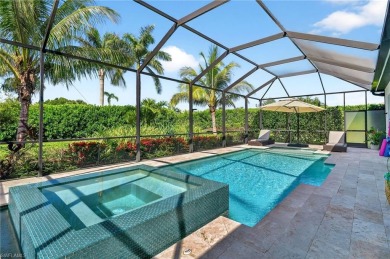 This nearly new luxury residence in the prestigious Marsh Cove on The Golf Club At Fiddlers Creek in Florida - for sale on GolfHomes.com, golf home, golf lot