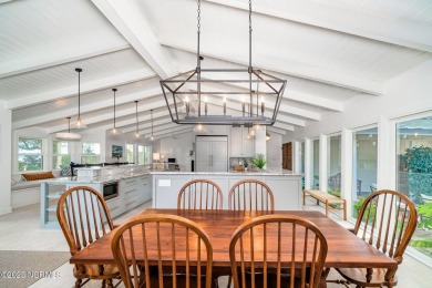 This stunning soundfront home in Pine Knoll Shores has been on The Country Club of the Crystal Coast in North Carolina - for sale on GolfHomes.com, golf home, golf lot