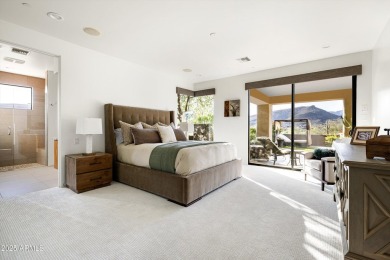 As you enter, you're greeted by soaring ceilings and walls of on Desert Mountain Golf Club - Renegade Course in Arizona - for sale on GolfHomes.com, golf home, golf lot