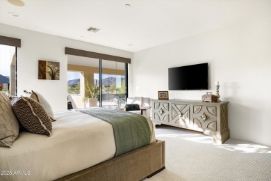 As you enter, you're greeted by soaring ceilings and walls of on Desert Mountain Golf Club - Renegade Course in Arizona - for sale on GolfHomes.com, golf home, golf lot