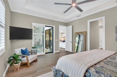 This nearly new luxury residence in the prestigious Marsh Cove on The Golf Club At Fiddlers Creek in Florida - for sale on GolfHomes.com, golf home, golf lot
