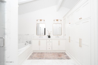 This stunning soundfront home in Pine Knoll Shores has been on The Country Club of the Crystal Coast in North Carolina - for sale on GolfHomes.com, golf home, golf lot