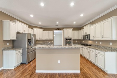 FANTASTIC VALUE! Gorgeous 3/2/2 w/ low maintenance landscaping on On Top of the World Golf Course in Florida - for sale on GolfHomes.com, golf home, golf lot