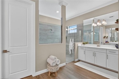 This nearly new luxury residence in the prestigious Marsh Cove on The Golf Club At Fiddlers Creek in Florida - for sale on GolfHomes.com, golf home, golf lot