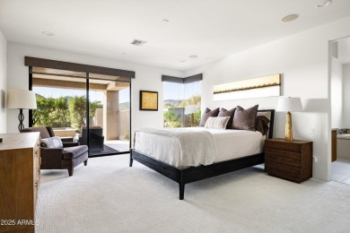 As you enter, you're greeted by soaring ceilings and walls of on Desert Mountain Golf Club - Renegade Course in Arizona - for sale on GolfHomes.com, golf home, golf lot