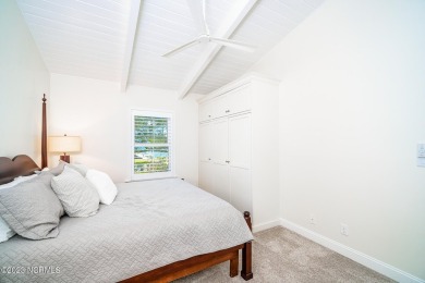 This stunning soundfront home in Pine Knoll Shores has been on The Country Club of the Crystal Coast in North Carolina - for sale on GolfHomes.com, golf home, golf lot