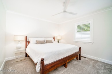 This stunning soundfront home in Pine Knoll Shores has been on The Country Club of the Crystal Coast in North Carolina - for sale on GolfHomes.com, golf home, golf lot