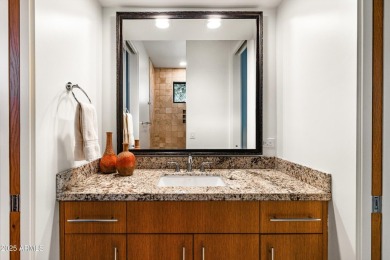 As you enter, you're greeted by soaring ceilings and walls of on Desert Mountain Golf Club - Renegade Course in Arizona - for sale on GolfHomes.com, golf home, golf lot