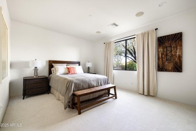 As you enter, you're greeted by soaring ceilings and walls of on Desert Mountain Golf Club - Renegade Course in Arizona - for sale on GolfHomes.com, golf home, golf lot