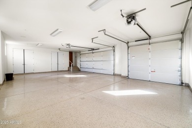 As you enter, you're greeted by soaring ceilings and walls of on Desert Mountain Golf Club - Renegade Course in Arizona - for sale on GolfHomes.com, golf home, golf lot