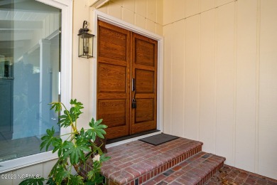 This stunning soundfront home in Pine Knoll Shores has been on The Country Club of the Crystal Coast in North Carolina - for sale on GolfHomes.com, golf home, golf lot