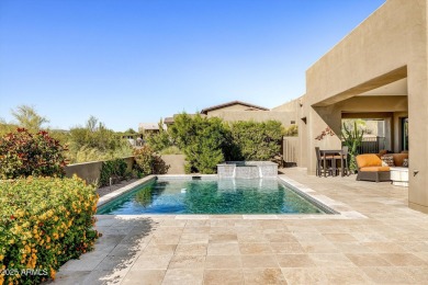 As you enter, you're greeted by soaring ceilings and walls of on Desert Mountain Golf Club - Renegade Course in Arizona - for sale on GolfHomes.com, golf home, golf lot