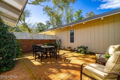 This stunning soundfront home in Pine Knoll Shores has been on The Country Club of the Crystal Coast in North Carolina - for sale on GolfHomes.com, golf home, golf lot