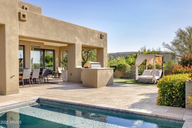 As you enter, you're greeted by soaring ceilings and walls of on Desert Mountain Golf Club - Renegade Course in Arizona - for sale on GolfHomes.com, golf home, golf lot