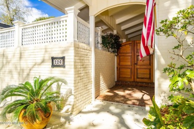 This stunning soundfront home in Pine Knoll Shores has been on The Country Club of the Crystal Coast in North Carolina - for sale on GolfHomes.com, golf home, golf lot