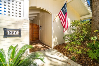 This stunning soundfront home in Pine Knoll Shores has been on The Country Club of the Crystal Coast in North Carolina - for sale on GolfHomes.com, golf home, golf lot
