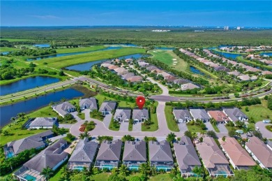 This nearly new luxury residence in the prestigious Marsh Cove on The Golf Club At Fiddlers Creek in Florida - for sale on GolfHomes.com, golf home, golf lot